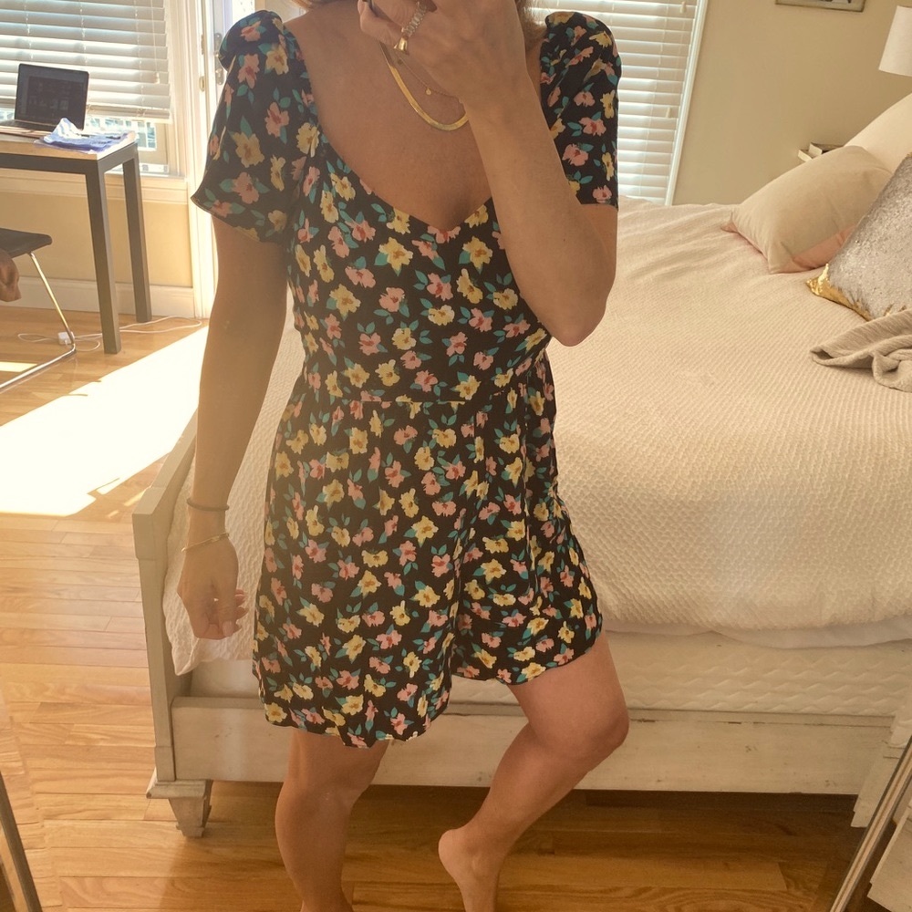 Black floral printed romper.